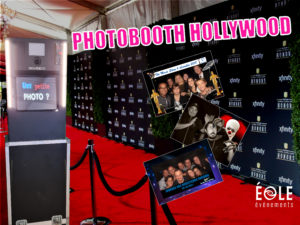 photobooth noir sur un décor de tapis rouge et des photos avec un décor de cinéma